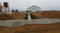 Foundation wall for steel building